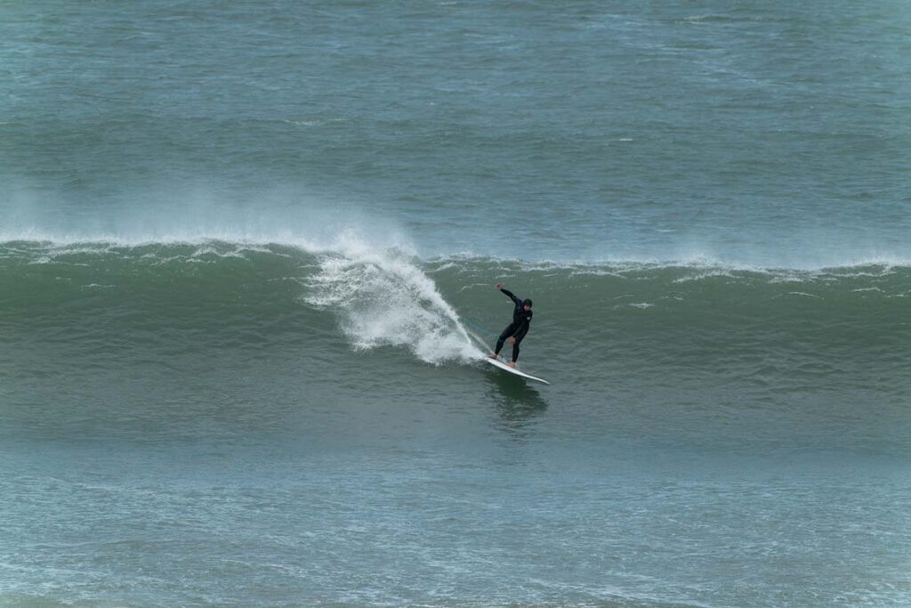 Surfer at Putsborough, North Devon. 07/04/20206